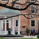 In this March 18, 2020, file photo, people remove belongings on campus at the University of North Carolina in Chapel Hill, N.C.